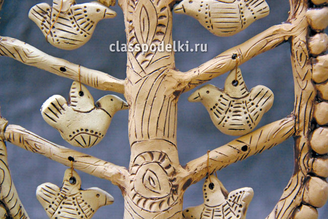 птички на дерево из керамики